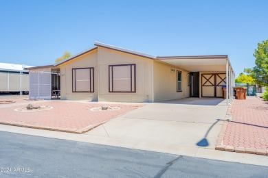 Welcome to this charming 3-bedroom, 2-bathroom home featuring a on 3 Parks Fairways in Arizona - for sale on GolfHomes.com, golf home, golf lot