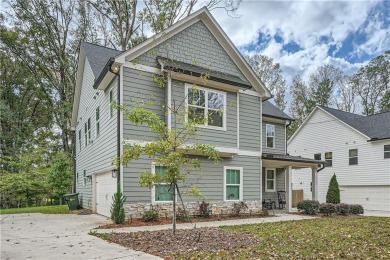 To see a walkthrough of the home, search *Modern Craftsman Dream on Browns Mill Golf Course in Georgia - for sale on GolfHomes.com, golf home, golf lot