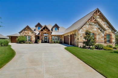 Spectacular custom home nestled on a quiet cul-de-sac with on Pecan Plantation Country Club in Texas - for sale on GolfHomes.com, golf home, golf lot