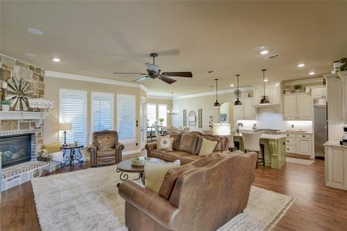Spectacular custom home nestled on a quiet cul-de-sac with on Pecan Plantation Country Club in Texas - for sale on GolfHomes.com, golf home, golf lot