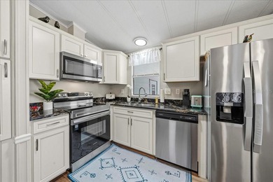 Welcome to this beautifully remodeled 2-bedroom, 2-bath on Silver Lake Executive Golf Course in Florida - for sale on GolfHomes.com, golf home, golf lot