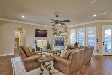 Spectacular custom home nestled on a quiet cul-de-sac with on Pecan Plantation Country Club in Texas - for sale on GolfHomes.com, golf home, golf lot