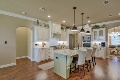 Spectacular custom home nestled on a quiet cul-de-sac with on Pecan Plantation Country Club in Texas - for sale on GolfHomes.com, golf home, golf lot