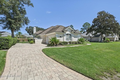Welcome to this beautifully updated 4-bedroom, 3-bathroom pool on Jacksonville Golf and Country Club in Florida - for sale on GolfHomes.com, golf home, golf lot