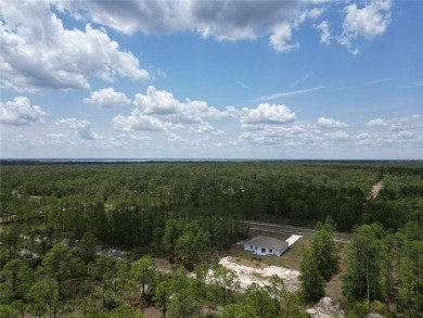 Located in a beautiful gated community, this property offers on Indian Lake Estates Golf and Country Club in Florida - for sale on GolfHomes.com, golf home, golf lot