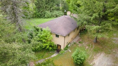 PRIME 9.5-ACRE OPPORTUNITY IN OXFORD! This exceptional property on Copper Hills Golf and Country Club in Michigan - for sale on GolfHomes.com, golf home, golf lot