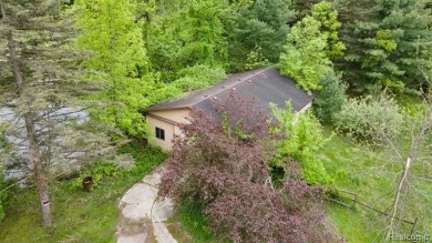 PRIME 9.5-ACRE OPPORTUNITY IN OXFORD! This exceptional property on Copper Hills Golf and Country Club in Michigan - for sale on GolfHomes.com, golf home, golf lot