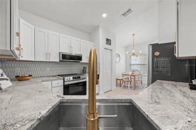 Welcome home to this beautifully updated 3-bedroom, 2-bathroom on Turkey Creek Golf and Country Club in Florida - for sale on GolfHomes.com, golf home, golf lot