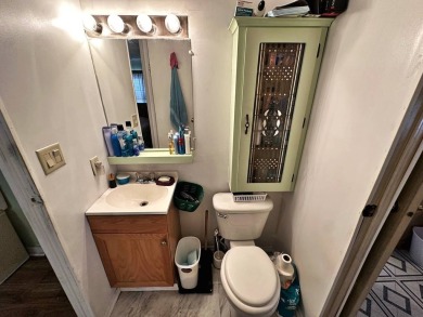 Welcome to your perfect retreat! This cozy 2 bedroom, 1 bathroom on Lake Henry Golf Club in Florida - for sale on GolfHomes.com, golf home, golf lot
