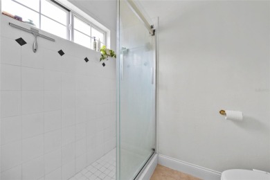 Welcome home to this beautifully updated 3-bedroom, 2-bathroom on Turkey Creek Golf and Country Club in Florida - for sale on GolfHomes.com, golf home, golf lot