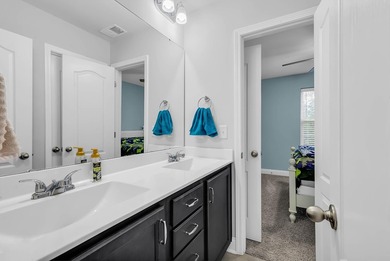 Welcome to this stunning two-story, three-bedroom on Shaftesbury Glen Golf and Fish Club in South Carolina - for sale on GolfHomes.com, golf home, golf lot