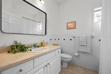 Welcome home to this beautifully updated 3-bedroom, 2-bathroom on Turkey Creek Golf and Country Club in Florida - for sale on GolfHomes.com, golf home, golf lot