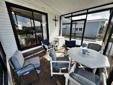 Welcome to your perfect retreat! This cozy 2 bedroom, 1 bathroom on Lake Henry Golf Club in Florida - for sale on GolfHomes.com, golf home, golf lot