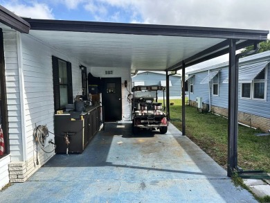 Welcome to your perfect retreat! This cozy 2 bedroom, 1 bathroom on Lake Henry Golf Club in Florida - for sale on GolfHomes.com, golf home, golf lot