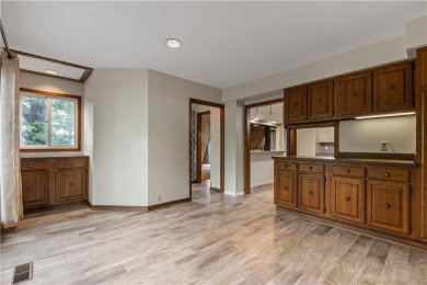 Discover this one-of-a-kind, three-level home nestled on two on Holiday Island Golf Course in Arkansas - for sale on GolfHomes.com, golf home, golf lot