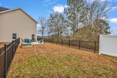 Welcome to this stunning two-story, three-bedroom on Shaftesbury Glen Golf and Fish Club in South Carolina - for sale on GolfHomes.com, golf home, golf lot