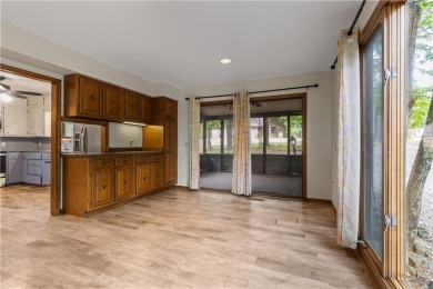 Discover this one-of-a-kind, three-level home nestled on two on Holiday Island Golf Course in Arkansas - for sale on GolfHomes.com, golf home, golf lot