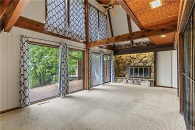 Discover this one-of-a-kind, three-level home nestled on two on Holiday Island Golf Course in Arkansas - for sale on GolfHomes.com, golf home, golf lot