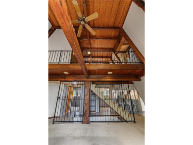Discover this one-of-a-kind, three-level home nestled on two on Holiday Island Golf Course in Arkansas - for sale on GolfHomes.com, golf home, golf lot