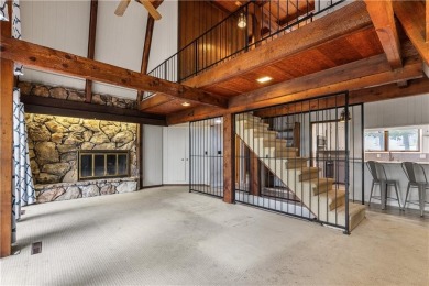 Discover this one-of-a-kind, three-level home nestled on two on Holiday Island Golf Course in Arkansas - for sale on GolfHomes.com, golf home, golf lot