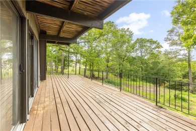 Discover this one-of-a-kind, three-level home nestled on two on Holiday Island Golf Course in Arkansas - for sale on GolfHomes.com, golf home, golf lot