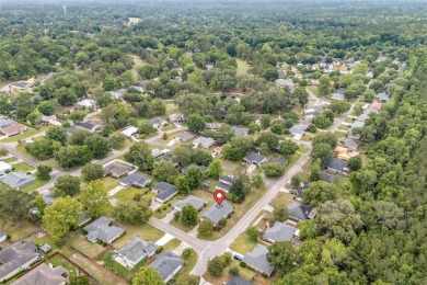 Welcome home to this beautifully updated 3-bedroom, 2-bathroom on Turkey Creek Golf and Country Club in Florida - for sale on GolfHomes.com, golf home, golf lot