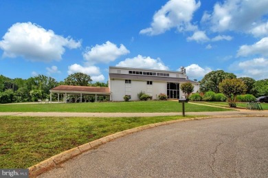 This lovingly maintained Dutch Colonial home offers timeless on Bay Hills Golf Club in Maryland - for sale on GolfHomes.com, golf home, golf lot