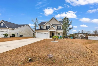 Welcome to this stunning two-story, three-bedroom on Shaftesbury Glen Golf and Fish Club in South Carolina - for sale on GolfHomes.com, golf home, golf lot