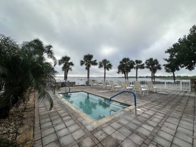 Welcome to your perfect retreat! This cozy 2 bedroom, 1 bathroom on Lake Henry Golf Club in Florida - for sale on GolfHomes.com, golf home, golf lot