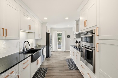 Nestled in the highly desirable Hunting Creek, this beautifully on Hunting Creek Country Club in Kentucky - for sale on GolfHomes.com, golf home, golf lot