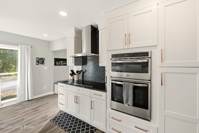 Nestled in the highly desirable Hunting Creek, this beautifully on Hunting Creek Country Club in Kentucky - for sale on GolfHomes.com, golf home, golf lot