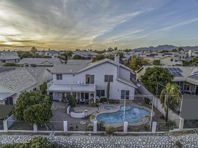 Discover luxurious living in this elegant 5-bedroom+den on  in Arizona - for sale on GolfHomes.com, golf home, golf lot