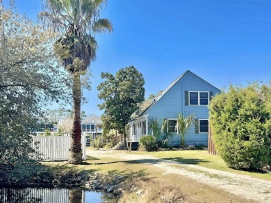 This one is DIFFERENT! You won't find your ordinary beach house on Surf Golf and Beach Club in South Carolina - for sale on GolfHomes.com, golf home, golf lot