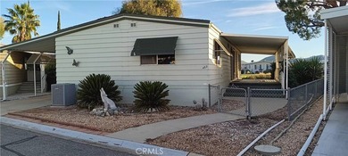 Nestled on the golf course in the sought-after 55+ resort on Hemet West Mobile Estates in California - for sale on GolfHomes.com, golf home, golf lot