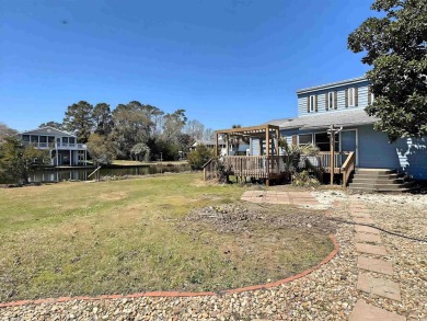 This one is DIFFERENT! You won't find your ordinary beach house on Surf Golf and Beach Club in South Carolina - for sale on GolfHomes.com, golf home, golf lot