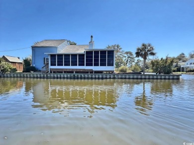 This one is DIFFERENT! You won't find your ordinary beach house on Surf Golf and Beach Club in South Carolina - for sale on GolfHomes.com, golf home, golf lot