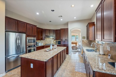 Welcome to 20834 W Western Dr, nestled in the heart of Verrado! on Verrado Golf Club  in Arizona - for sale on GolfHomes.com, golf home, golf lot