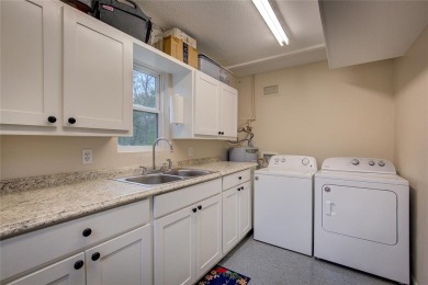 Located in the prestigious Sulphur Springs Country Club, this on Sulphur Springs Country Club in Texas - for sale on GolfHomes.com, golf home, golf lot
