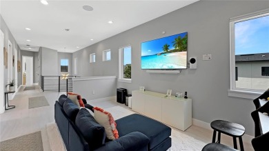 Welcome To This Ultra-Modern, Custom-Designed Two-Story Smart on Reunion Resort Golf Course in Florida - for sale on GolfHomes.com, golf home, golf lot
