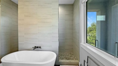Welcome To This Ultra-Modern, Custom-Designed Two-Story Smart on Reunion Resort Golf Course in Florida - for sale on GolfHomes.com, golf home, golf lot