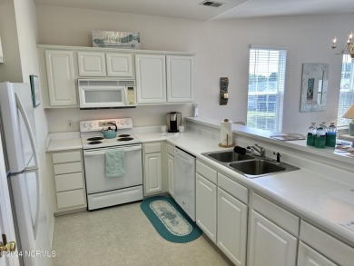 Investors, take note of this clean, bright, furnished, third on Sandpiper Bay Golf and Country Club in North Carolina - for sale on GolfHomes.com, golf home, golf lot