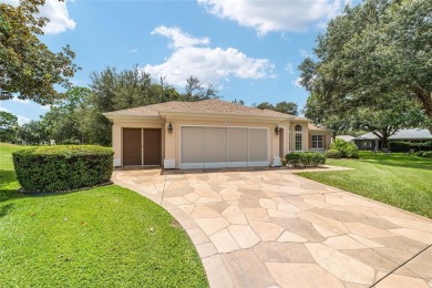 Located on a quiet cul-de-sac with golf course views, this on Eagle Ridge At Spruce Creek Country Club in Florida - for sale on GolfHomes.com, golf home, golf lot