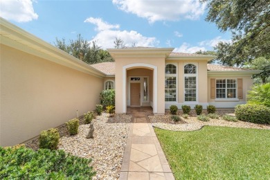 Located on a quiet cul-de-sac with golf course views, this on Eagle Ridge At Spruce Creek Country Club in Florida - for sale on GolfHomes.com, golf home, golf lot
