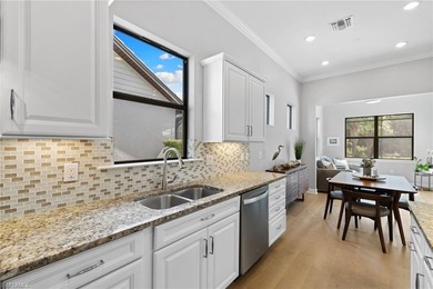 This modern and immaculate two-bedroom plus den residence offers on Calusa Pines Golf Club in Florida - for sale on GolfHomes.com, golf home, golf lot