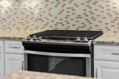 This modern and immaculate two-bedroom plus den residence offers on Calusa Pines Golf Club in Florida - for sale on GolfHomes.com, golf home, golf lot