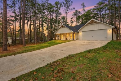 Experience relaxed living in this beautiful new construction on Rayburn Country Club in Texas - for sale on GolfHomes.com, golf home, golf lot