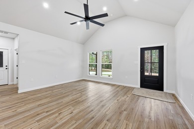 Experience relaxed living in this beautiful new construction on Rayburn Country Club in Texas - for sale on GolfHomes.com, golf home, golf lot