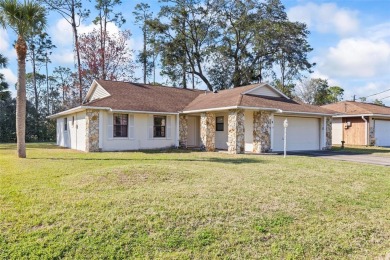 PINE LAKES home that's less than a 1/2 mile from the Pine Lakes on The Grand Club - Pine Lakes Course in Florida - for sale on GolfHomes.com, golf home, golf lot