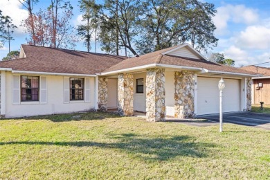 PINE LAKES home that's less than a 1/2 mile from the Pine Lakes on The Grand Club - Pine Lakes Course in Florida - for sale on GolfHomes.com, golf home, golf lot