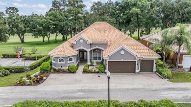 STUNNING POOL HOME located in the prestigious Lake Jovita Golf on Lake Jovita Golf and Country Club in Florida - for sale on GolfHomes.com, golf home, golf lot